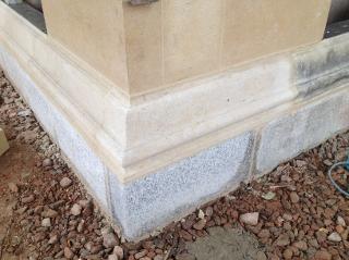 new stone plinth moulding exacting fit with old.
